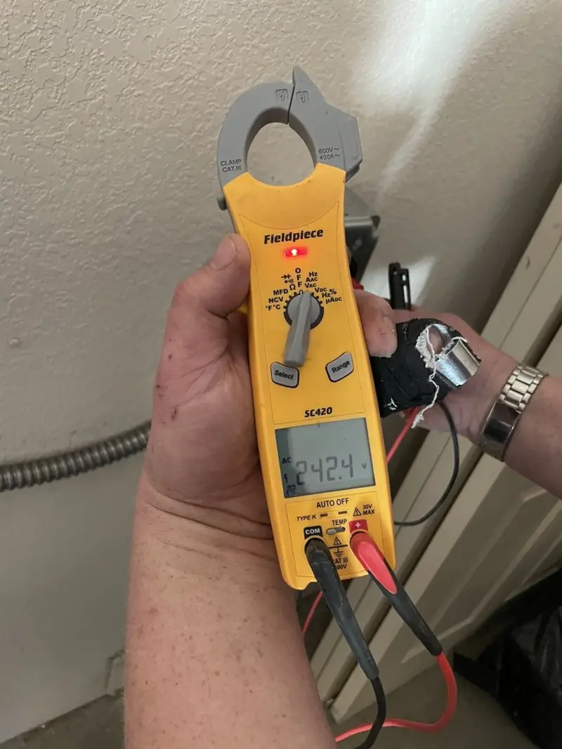 Voltage testing with clamp meter during Generator Installation in New Hartford